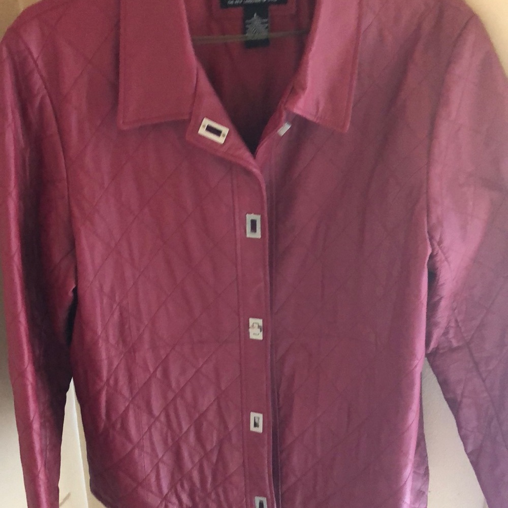Woman’s large burgundy jacket